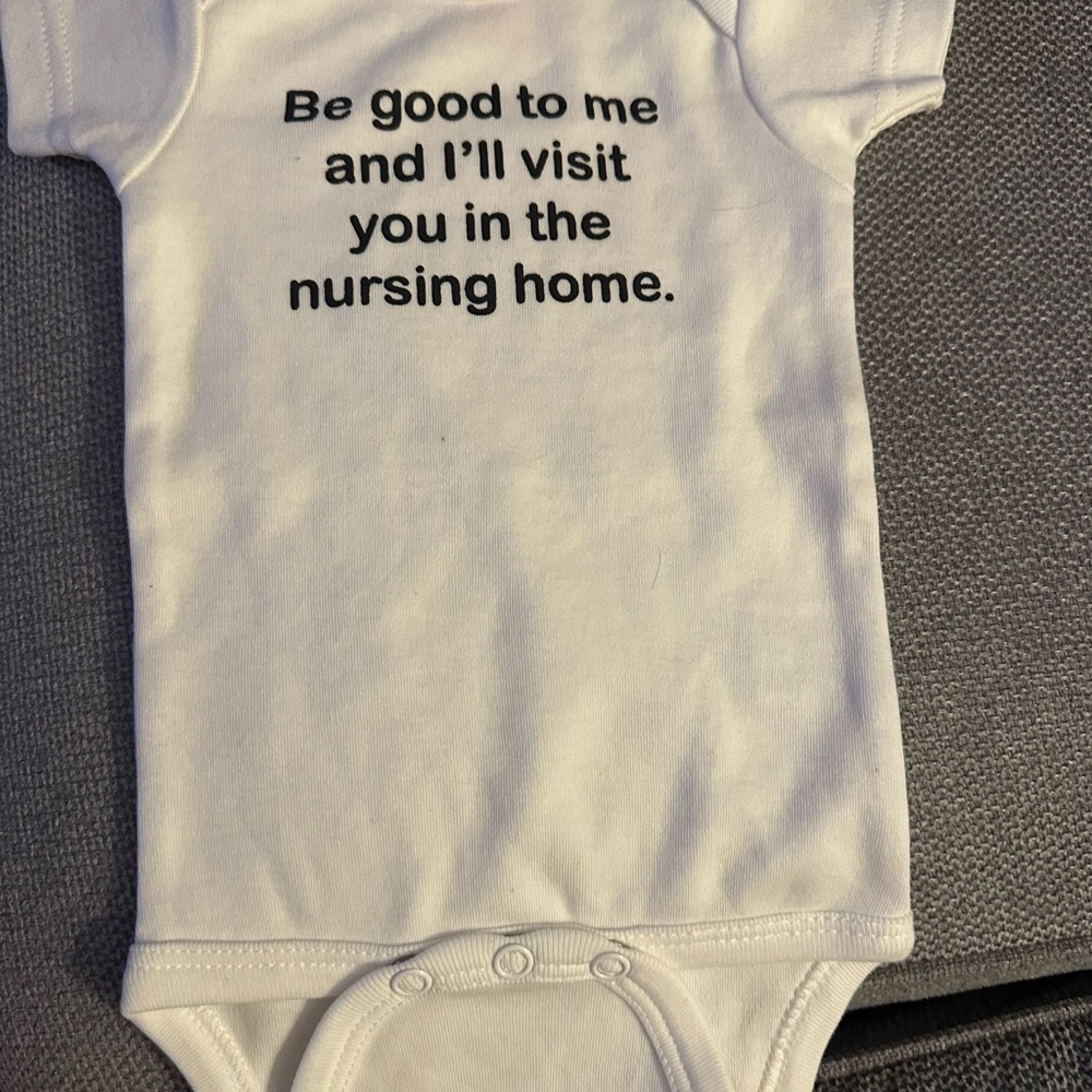 Sara Kety White Baby Onesie with Black Text